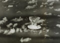 FILE PHOTO: Handout of a mushroom cloud rises with ships below during Operation Crossroads nuclear weapons test on Bikini ...