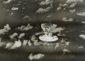 FILE PHOTO: Handout of a mushroom cloud rises with ships below during Operation Crossroads nuclear weapons test on Bikini ...