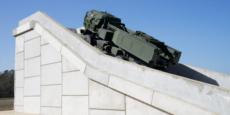 FILE PHOTO: HIMARS missile launcher vehicles assembled at Lockheed Martin in Camden, Arkansas