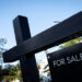 FILE PHOTO: A "For Sale" sign stands at a house in Miami
