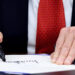 U.S. President Trump signs the funding bill to end the government shutdown, in Washington, D.C.