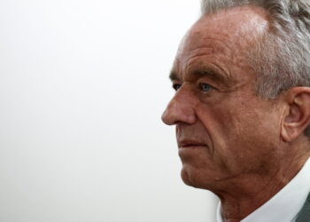 RFK Jr., walks through the Dirksen Senate Office Building between meetings with senators on Capitol Hill in Washington