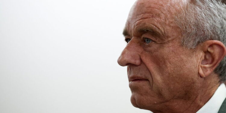 RFK Jr., walks through the Dirksen Senate Office Building between meetings with senators on Capitol Hill in Washington