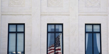 U.S. Supreme Court justices to hear oral arguments on U.S. President Trump's bid to preserve sweeping tariffs, in Washingt...