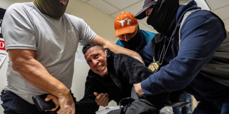 FILE PHOTO: Federal immigration officers at a U.S. immigration court in New York City