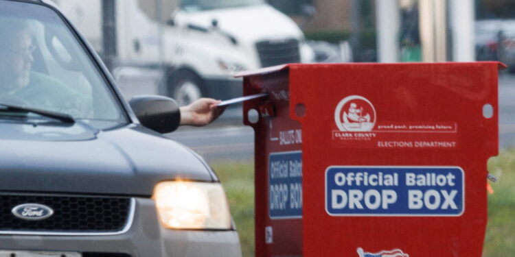 A freshly replaced ballot box replaces one that had been charred by arson in Vancouver, Washington