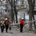 FILE PHOTO: Emergency responders work at the site of a Russian drone strike on an apartment building, in Kyiv