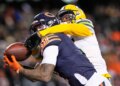 Chicago Bears wide receiver DJ Moore catches a 46-yard touchdown pass as the Green Bay Packers' Keisean Nixon defends to give the Bears a 22-16 overtime win on Saturday night in Chicago. (AP Photo/Nam Huh)