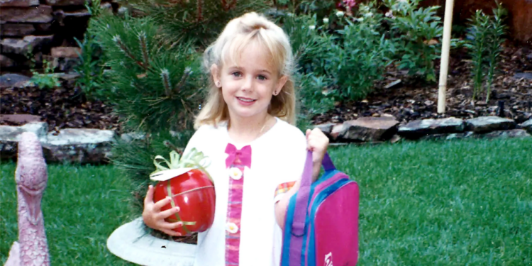 JonBenét Ramsey, holding a backpack, was a 6-year-old child whose 1996 murder inside her Colorado, home shocked the nation. Nearly three decades later, her family says advances in DNA testing bring renewed hope that the mystery surrounding her death could finally be solved.