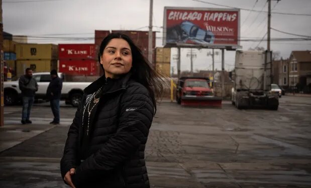 Marimar Martinez outside a truck service shop on Dec. 26, 2025, where she called 911 after she was shot five times in October by a Border Patrol agent in Brighton Park. Prosecutors originally claimed Martinez, as part of a convoy of protesters, rammed federal agents' vehicle near 39th Street and Kedzie Avenue and then tried to run over an agent, but felony charges were later dropped after her attorney argued agents caused the crash and needlessly shot her. (E. Jason Wambsgans/Chicago Tribune)