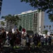 Community members take part in the Dena Protest that started a Pasadena City Hall and walked by four hotels, the Dena Hotel Pasadena, Hilton Pasadena, AC Hotel Pasadena, Westin Hotel Pasadena, in the area that housed ICE officials