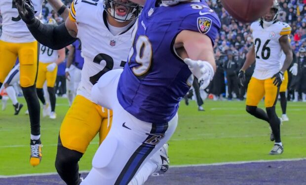 Baltimore Ravens tight end Mark Andrews fails to catch a high pass while Pittsburgh Steelers defensive back Chuck Clark defends during the second quarter of an AFC North division showdown of NFL football in Baltimore. (Karl Merton Ferron/Staff)