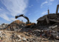 Heavy machinery operates at a site as as Hamas says it continues to search for the bodies of deceased hostages, in Beit La...