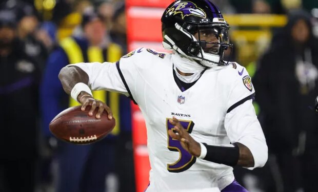 Baltimore Ravens quarterback Tyler Huntley (5) looks to throw against the Green Bay Packers during the first half of an NFL football game, Saturday, Dec. 27, 2025, in Green Bay, Wis. (AP Photo/Mike Roemer)