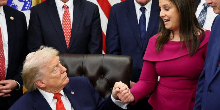 U.S. President Donald Trump signs a bill to award congressional gold medals to members of the 1980 U.S. Olympic men's hock...