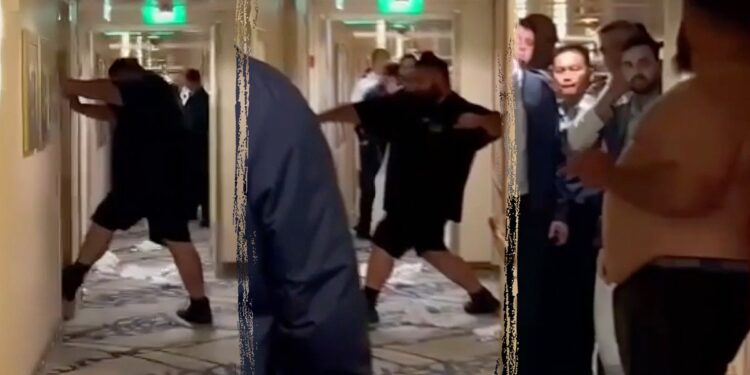 Michael Virgil kicks cruise ship door.