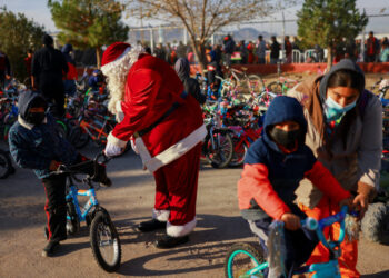Annual gift-giving event for children in need organized by the fire department, in Ciudad Juarez