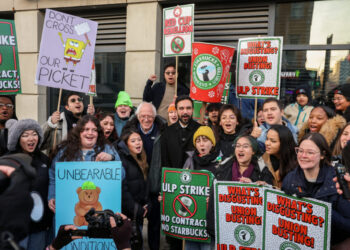 New York City mayor-elect Zohran Mamdani and U.S. Senator Bernie Sanders support striking Starbucks workers in Brooklyn, N...