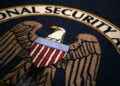 The logo of the U.S. National Security Agency during a visit by U.S. President George W. Bush to the agency's installation...