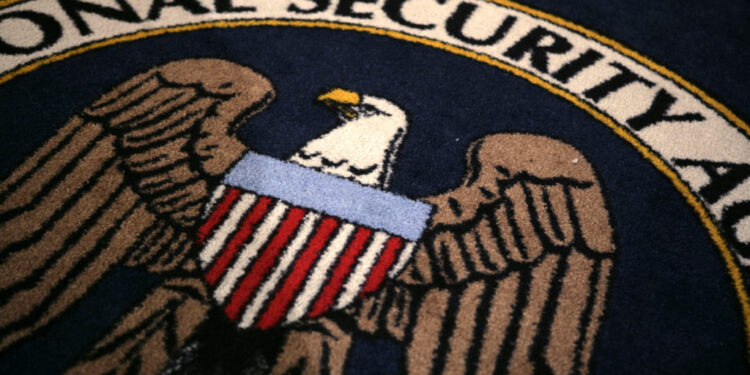 The logo of the U.S. National Security Agency during a visit by U.S. President George W. Bush to the agency's installation...