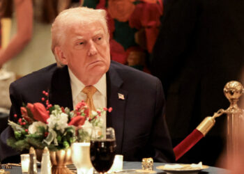 U.S. President Trump takes part in a Christmas Eve dinner in the ballroom of his Mar-a-Lago club in Palm Beach