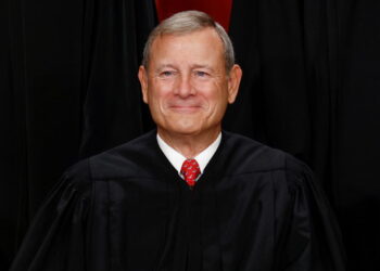 U.S. Supreme Court justices pose for their group portrait at the Supreme Court in Washington