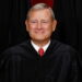 U.S. Supreme Court justices pose for their group portrait at the Supreme Court in Washington