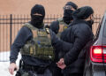 Members of U.S. Immigration and Customs Enforcement (ICE) conduct raids in Minneapolis