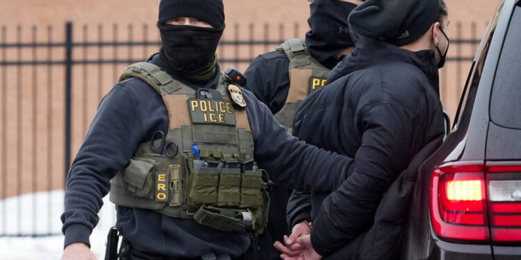 Members of U.S. Immigration and Customs Enforcement (ICE) conduct raids in Minneapolis