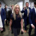 U.S. Representative Marjorie Taylor Greene (R-GA) walks to her final vote, surrounded by staff, in Washington