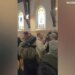 Anti-ICE protesters inside a church
