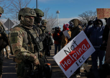 Demonstration against increased immigration enforcement, after a U.S. Immigration and Customs Enforcement (ICE) agent fata...