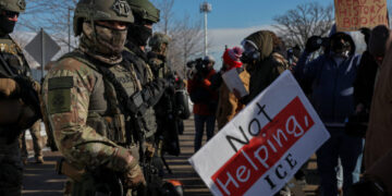 Demonstration against increased immigration enforcement, after a U.S. Immigration and Customs Enforcement (ICE) agent fata...