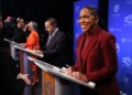 U.S. Senate contender Lt. Gov. Juliana Stratton (right) prepares alongside fellow contenders U.S. Reps. Robin Kelly (third from right) and Raja Krishnamoorthi (second from right), before their debate on Jan. 29, 2026, at WLS-Ch. 7. (Chris Sweda/Chicago Tribune)
