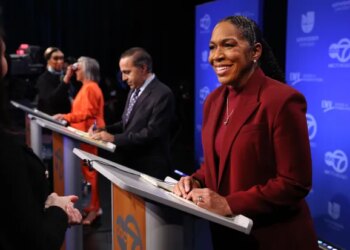 U.S. Senate contender Lt. Gov. Juliana Stratton (right) prepares alongside fellow contenders U.S. Reps. Robin Kelly (third from right) and Raja Krishnamoorthi (second from right), before their debate on Jan. 29, 2026, at WLS-Ch. 7. (Chris Sweda/Chicago Tribune)