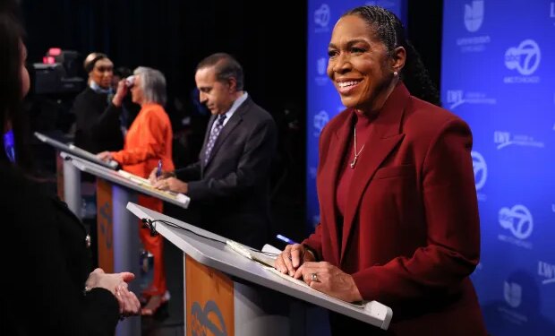 U.S. Senate contender Lt. Gov. Juliana Stratton (right) prepares alongside fellow contenders U.S. Reps. Robin Kelly (third from right) and Raja Krishnamoorthi (second from right), before their debate on Jan. 29, 2026, at WLS-Ch. 7. (Chris Sweda/Chicago Tribune)