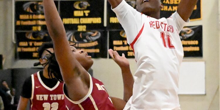 Edmondsonâs Nayshawn Williams takes a shot as New Townâs Mekiye...