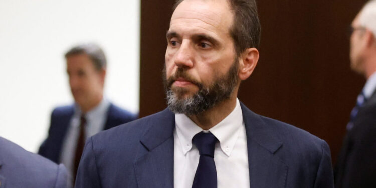 U.S. Special Counsel Jack Smith arrives to make a statement to reporters about the 37 federal charges returned by a grand ...