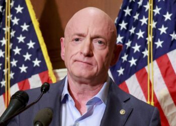 FILE PHOTO: Pentagon to cut Senator Kelly's military retirement pay for misconduct