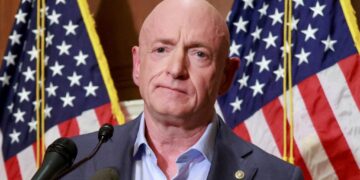 FILE PHOTO: Pentagon to cut Senator Kelly's military retirement pay for misconduct