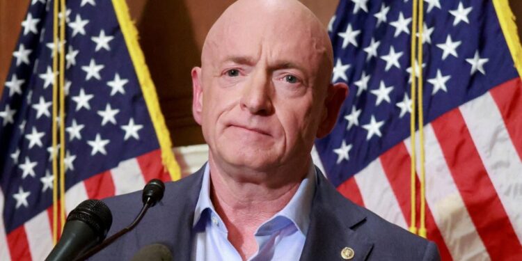 FILE PHOTO: Pentagon to cut Senator Kelly's military retirement pay for misconduct