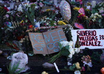 Makeshift memorial near the site of the fatal shooting of Renee Nicole Good by a U.S. Immigration and Customs Enforcement ...