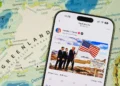 Smartphone Displays Donald Trump Post on Truth Social About Greenland