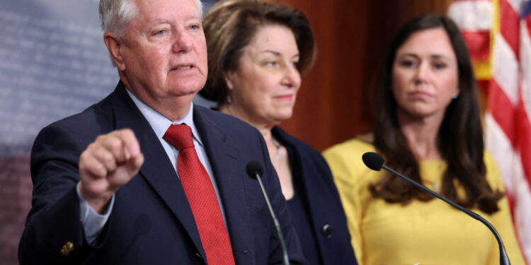 U.S. Senator Graham leads a news conference to announce legislation to name Russia a state sponsor of terrorism, at the U....