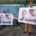 Family members of detainees wait outside the Helicoide detention centre, in Caracas