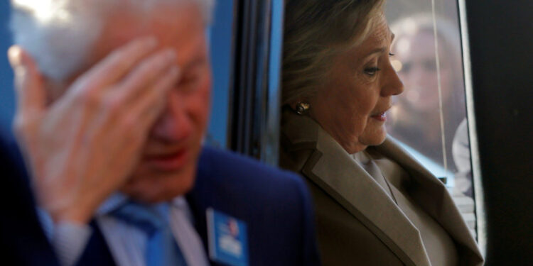 U.S. Democratic presidential nominee Hillary Clinton gets into her vehicle after she and her husband, former U.S. Presiden...