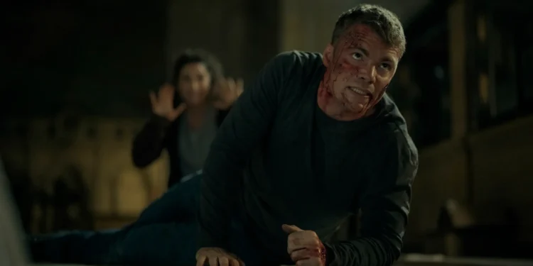 The Night Agent. (L to R) Michaela Watkins as Freya, Gabriel Basso as Peter Sutherland in episode 310 of The Night Agent. Cr. Christopher Saunders/Netflix © 2026