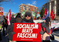 In an anti-Trump march, Democratic Socialists of America members carried signs against "fascism."