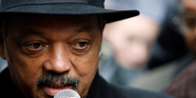 FILE PHOTO: Reverend Jesse Jackson speaks at a rally calling for an end to predatory lending practices and home foreclosur...