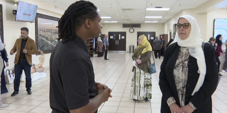 two shot BROKEN ARROW MOSQUE OPEN HOUSE